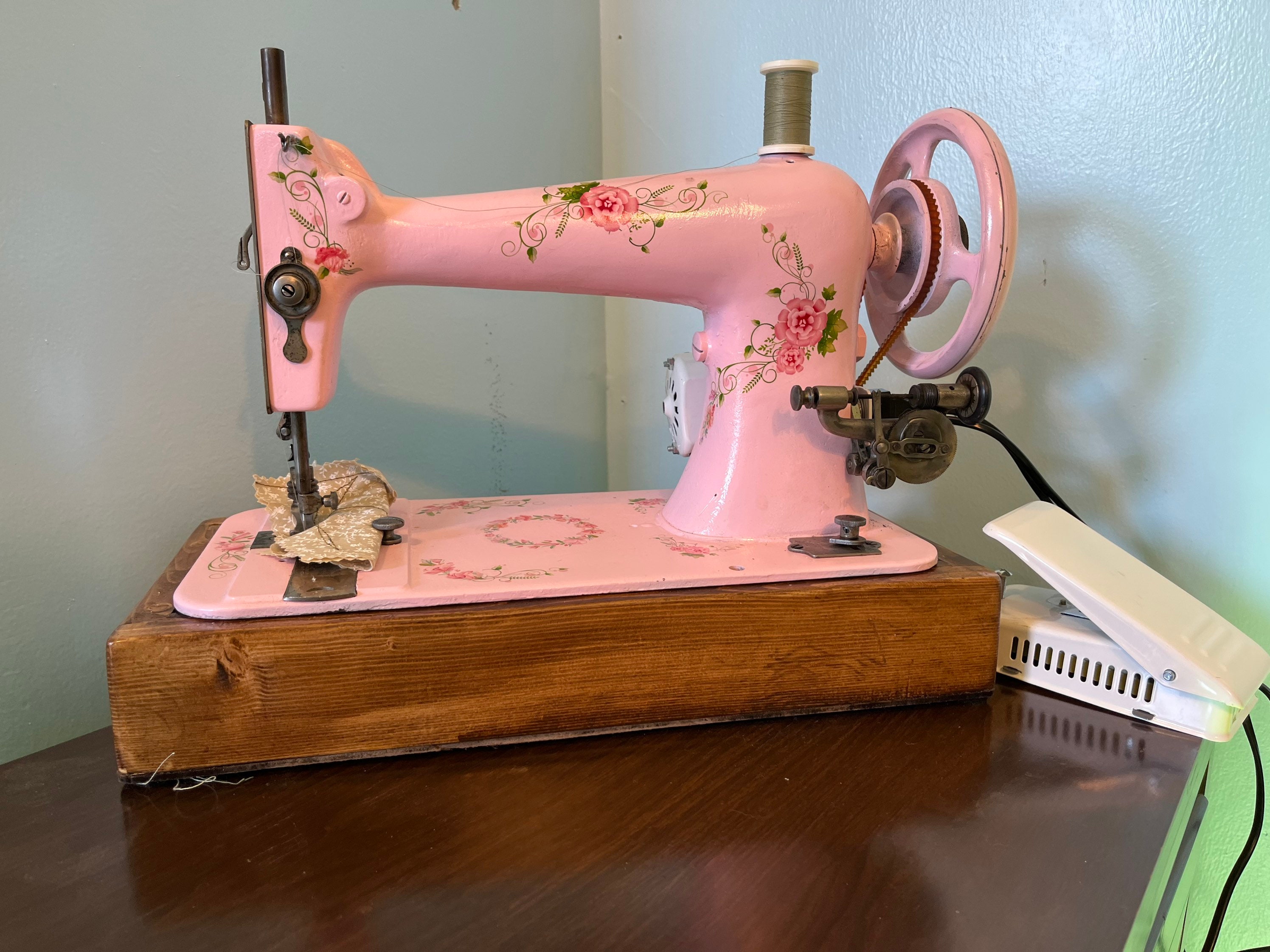 Pink 1890s antique sewing machine and attachments restored and refinished!