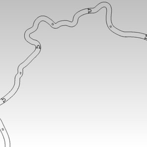 May include: A black and white line drawing of a race track with numbered turns.