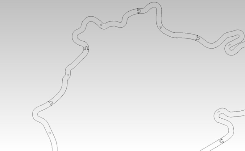 May include: A black and white line drawing of a race track with numbered turns.