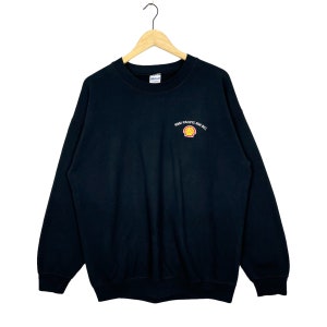 Sudadera con cuello redondo y bordado vintage de Shell R&M Pacific Rim Inc., color negro, talla L, fabricada en Honduras