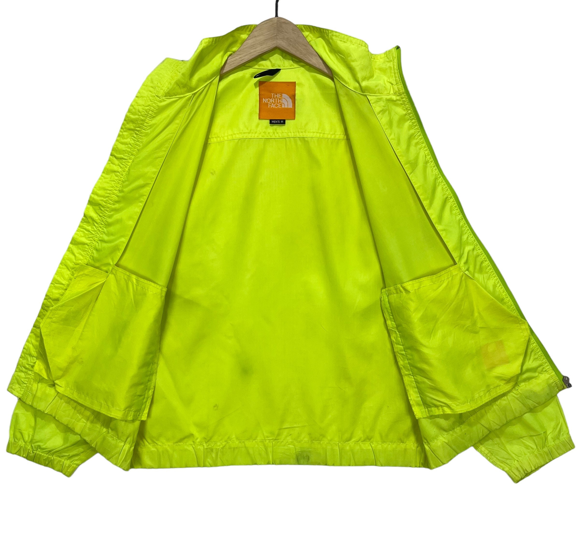 THE NORTH FACE 蛍光グリーン ウィンドブレーカー 【公式通販】
