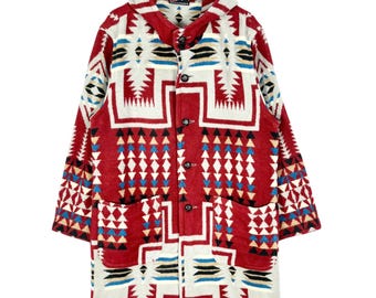 May include: A long, hooded coat with a vibrant geometric pattern in red, white, black, and blue. The coat features a button-up front, two front pockets, and a hood. The design is reminiscent of Native American textiles.