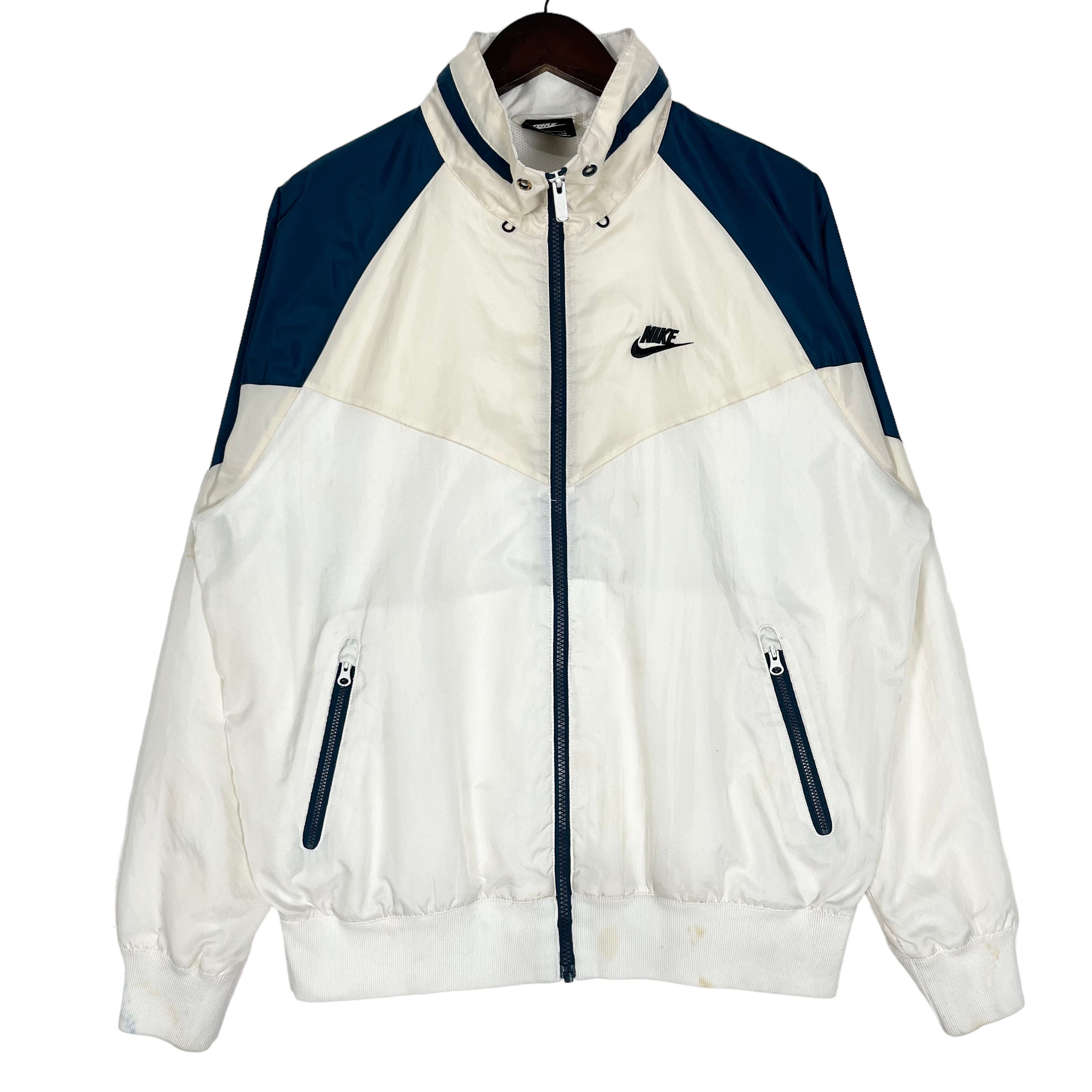 Nike big swoosh jacket price hotsell