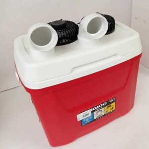 May include: Red Igloo cooler with a white lid and two black fans on top. The cooler has a white label with the Igloo logo and the text "28 Quart" on it.