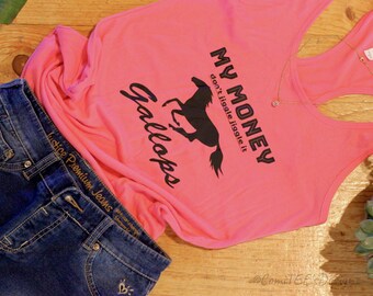 May include: Pink tank top with a black silhouette of a horse galloping and the text "MY MONEY don't jiggle jiggle it gallops".