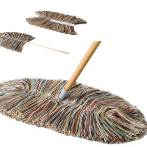 May include: A multi-colored, long-handled dust mop with a wooden handle and a large, oval-shaped head. The mop head is made of a thick, fluffy material that is perfect for cleaning floors.