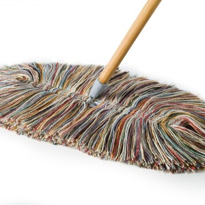 May include: A multi-colored string mop with a wooden handle. The mop head is made of a variety of colors, including red, blue, green, and yellow.