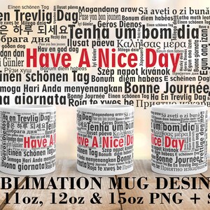 May include: Three white mugs with a black and red word cloud design that says "Have A Nice Day" in red. The mugs are 11oz, 12oz, and 15oz. The word cloud includes greetings in multiple languages.