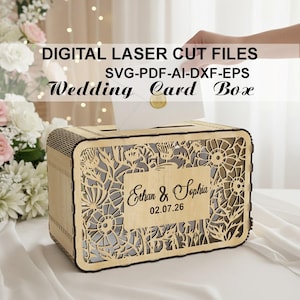 May include: A wooden wedding card box with intricate floral cutouts. The box features the names "Ethan & Sophia" and the date "02.07.26" engraved on the front. The text "DIGITAL LASER CUT FILES" and "Wedding Card Box" are also visible.