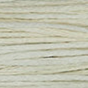 May include: A close-up of a spool of natural-colored twine. The twine is made of a natural fiber and has a rough texture.