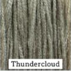May include: A close-up of a gray yarn with a subtle sheen. The yarn is called "Thundercloud".