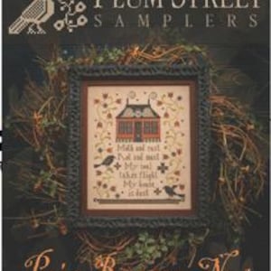 May include: A framed cross-stitch sampler titled Prim Reaper, No 1 by Plum Street Samplers. The design features a house, birds, and floral vines with the text: Moth and rust, Rot and must, My soul takes flight, My house is dust, in black thread.