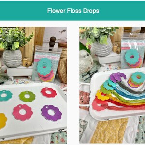 May include: A set of colorful flower floss drops with a flower-shaped hole in the center. The drops are arranged on a white tray with a floral pattern. The drops are packaged in a clear plastic bag with the text "Flower Floss Drops" printed on it.