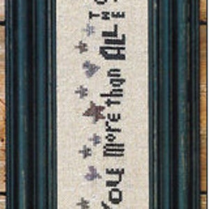 May include: A framed cross-stitch design with a white background and blue and red stitching. The design features a heart and stars with the text "I Love You More Than All The Stars In The Sky."
