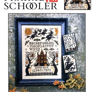 May include: A framed cross-stitch pattern titled "Witching Hour" featuring a spooky house, witches on brooms, and the text "GOOD BYE 1234567890". The design includes a smaller cross-stitch with the text "HALLOWEEN NIGHT".