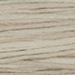 May include: Close-up of a beige, natural fiber rope. The rope is made of twisted strands and has a rough texture.