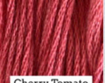May include: Close-up of a spool of red embroidery floss, labeled "Cherry Tomato".