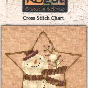 May include: A cross stitch chart featuring a star-shaped snowman design. The snowman has a brown hat and scarf, with a carrot nose and stick arms. The chart is labeled "XS149 - Star Shaped Snowman" and includes the text "Teresa Kogut Creative Whims".
