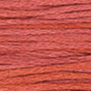 May include: A close-up of a deep red, textured cord. The cord is made of a soft, natural fiber and has a slightly rough texture.