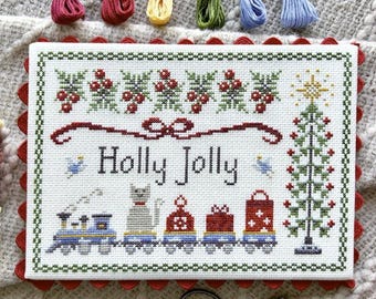 May include: A white cross-stitch pattern with a red, green, and white color scheme. The pattern features a train with a cat, a Christmas tree, and the text "Holly Jolly".