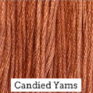 May include: A spool of embroidery floss in a warm orange color, labeled "Candied Yams".