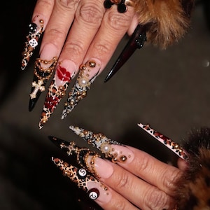 Luxury custom nails/free style/party nails/cheetah nails/star nails/red nails/black nails/gold charms nails/cross nails/bling nail/lace nail