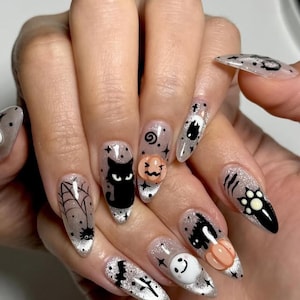 Luxury custom nails/ free style/halloween nails/spooky nails/cat nails/cute halloween nails/silver cat eye glitter black white nails/ witchy