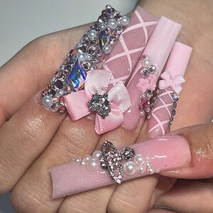 Luxury custom nails/ free style/ long nails/kawaii nails/ pink junk nails/ cute nails/coquette nails/pink charm nails/ bling rhinestone nail