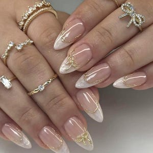 Luxury custom nails/ free style/ long nails/pearl wedding nails/pearly french nails/french tip nails/white nails/gold charms nails/nails bow