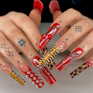 Luxury custom nails/ free style/long nails/party nails/silver nails/tiger print nails/french tip nails/red chrome nails/animal print nails