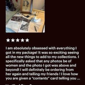 May include: An assortment of vintage items, including a framed portrait of a woman, postcards, and a small sculpture. The items are arranged on a wooden surface, with a customer review below.
