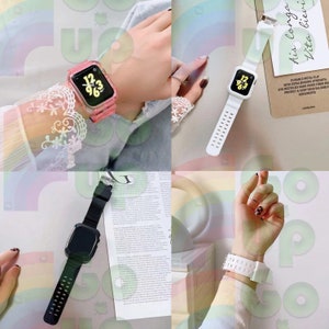 May include: Three different styles of watch bands for an Apple Watch. The first band is clear pink with a black screen, the second is white with a white screen, and the third is black with a black screen.