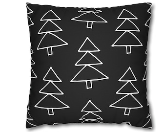 May include: Black and white throw pillow with a repeating pattern of stylized Christmas trees.