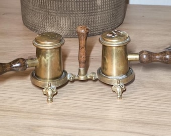 A beautiful brass salt and pepper set that I believe is from the 1970&#39;s.