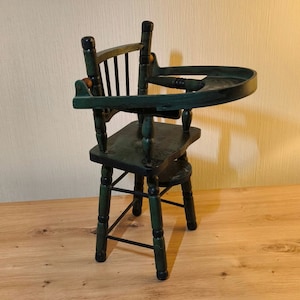 Antique doll chair.