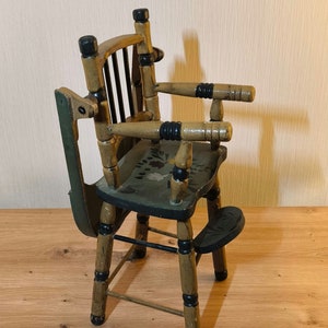 Antique doll chair.