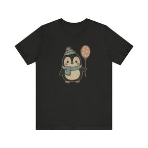 Cute Penguin Balloon Shirt, Winter Animal Graphic Tee, Vintage Style Christmas Shirt, Cozy Holiday T-Shirt, Retro Snow Penguin Gift