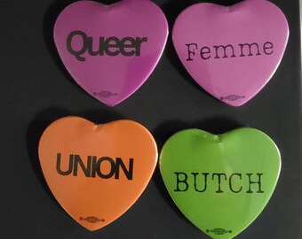 Heart shaped button, queer, union,  femme or butch.