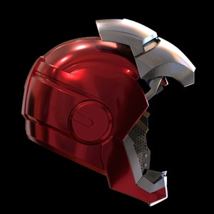 May include: A red and silver helmet with a visor. The helmet is open on one side, revealing the interior.