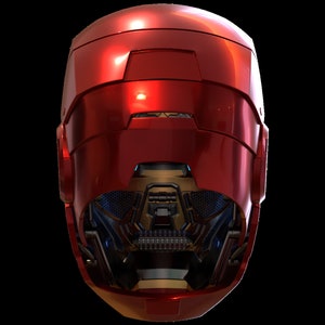 May include: A red and gold helmet with a futuristic design. The helmet has a visor and a series of lights and vents.