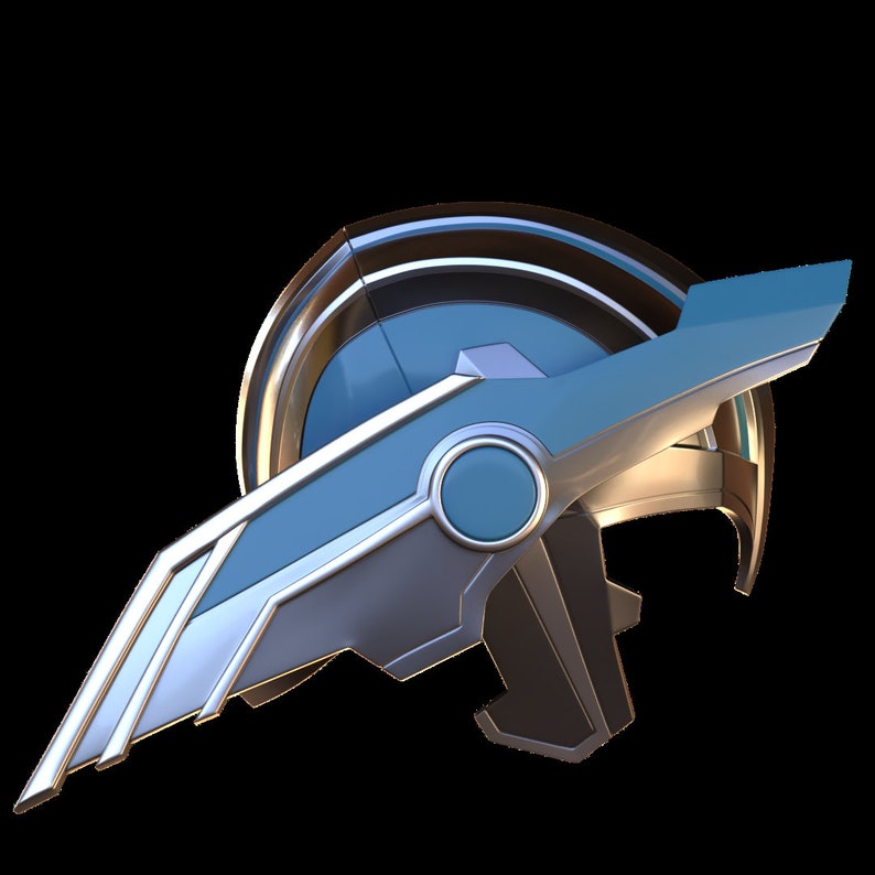 May include: A silver and blue helmet with a wing design. The helmet has a circular opening on the side and a raised ridge around the top.