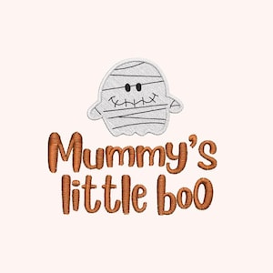May include: A Halloween-themed design featuring a mummy-like ghost with stitched details and the text "Mummy's little boo" in a warm, orange-brown color. The ghost has black eyes and a stitched smile.