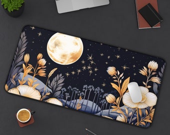 May include: A rectangular desk mat with a night sky design, featuring a large, golden moon and stars. The mat has a floral and foliage border in gold, blue, and white. A white computer mouse is placed on the mat.