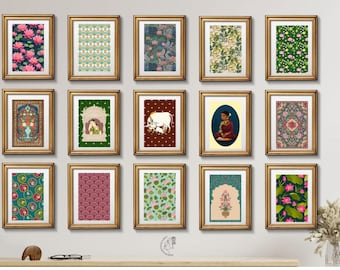 May include: A wall gallery of 15 framed prints featuring a variety of Indian-inspired designs. The prints include floral patterns, geometric designs, and traditional artwork. The frames are all gold and have a simple, elegant design.