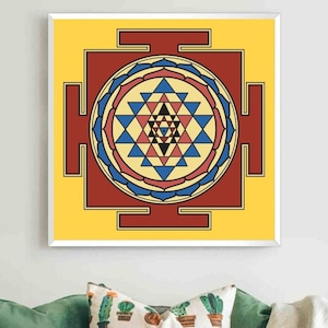 May include: A yellow square with a red, blue, and white geometric design in the center. The design is a mandala with a star shape in the middle.