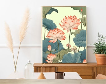 May include: A framed art print featuring a watercolor illustration of lotus flowers. The artwork showcases large, open blooms in shades of pink and white, surrounded by blue-green leaves against a pale yellow background. The print is displayed on a wooden cabinet.