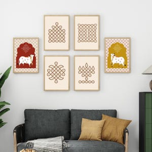 May include: A collection of six framed art prints. Two prints feature a cow illustration in a red and yellow archway. The other four prints display brown geometric patterns on a cream background. The frames are a light wood color.