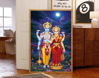 May include: A framed print depicting two figures in traditional Indian attire, set against a backdrop of a moonlit sky and lush foliage. The figures are adorned with gold jewelry and hold symbolic objects. The artwork is framed in a wooden border.