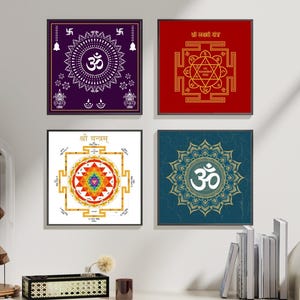 May include: Four framed square art prints with spiritual designs. The prints feature intricate patterns and symbols in white, gold, and red against backgrounds of purple, red, white, and teal. The artwork includes the Om symbol and geometric shapes.