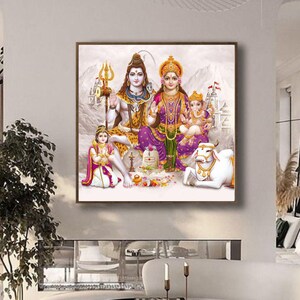 May include: A colorful painting depicting Hindu deities Shiva and Parvati with their son Ganesha. Shiva is holding a trident and Parvati is wearing a purple sari. A white cow is in the foreground.